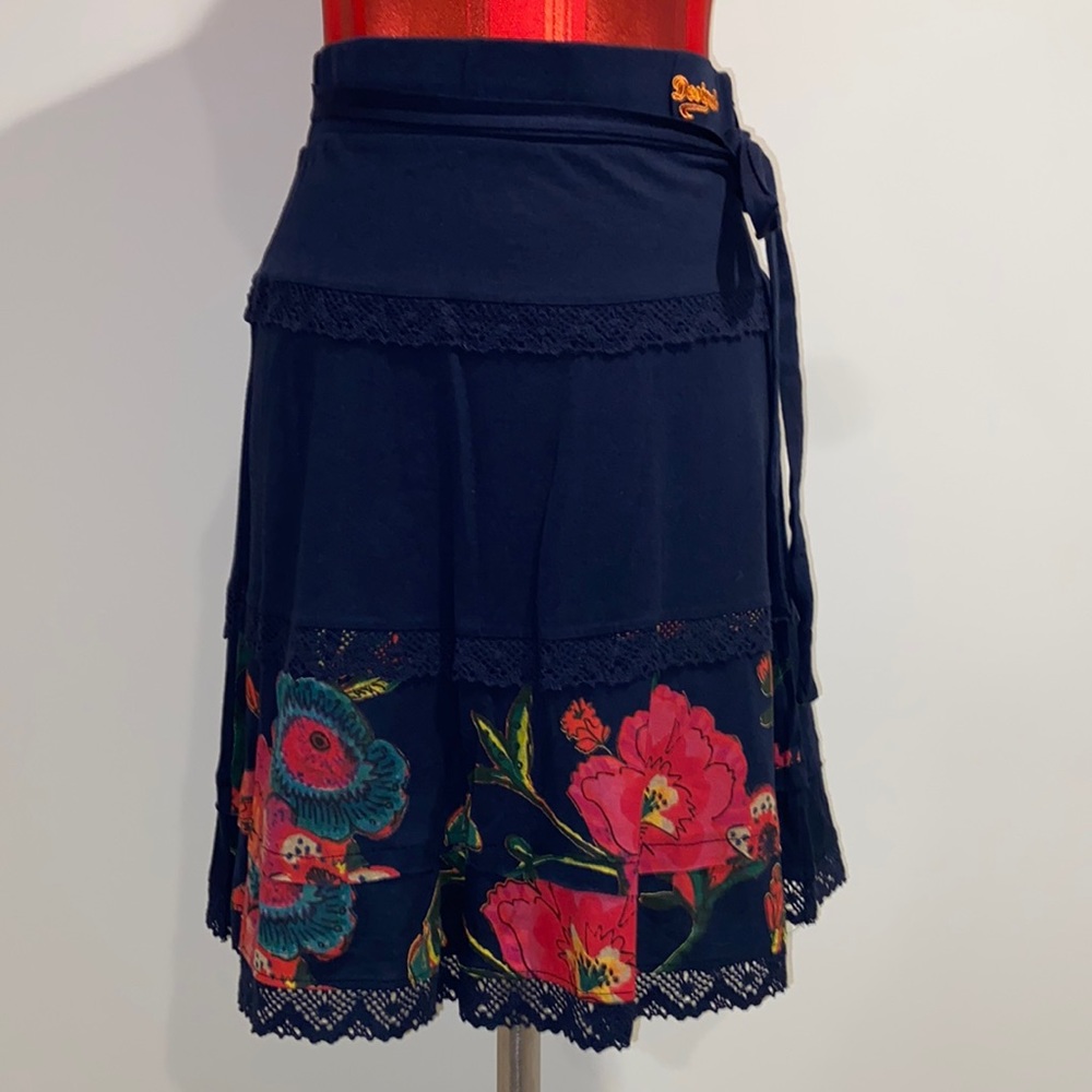 Blue Desigual Skirt with crochet bottom and popping flower graphics.